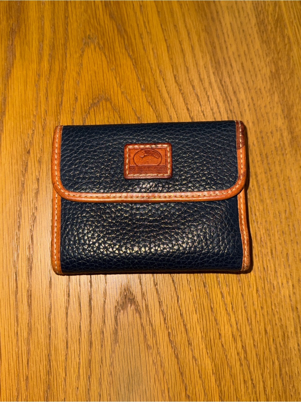 Dooney & Bourke Navy and Brown Pebbled Leather Bi-Fold Wallet